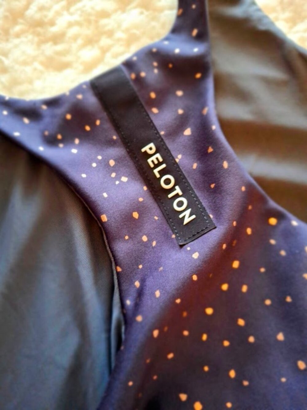 Peloton Black Crop Top with Gold Details – Size Large